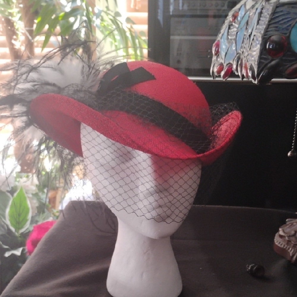 Elegant Red Feathered Hat